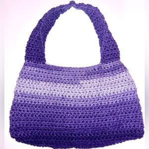 Handmade crochet medium size shoulder bag in the color purple.